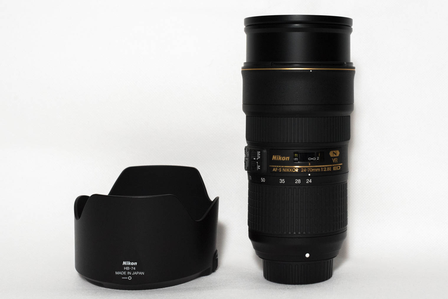 Nikon AF-S Nikkor 24-70 mm f/2.8 ED VR at 24 mm and the lens hood